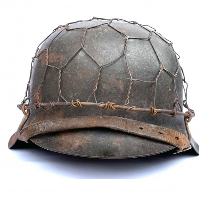 Heer M42 steel helmet with chiken wire camo