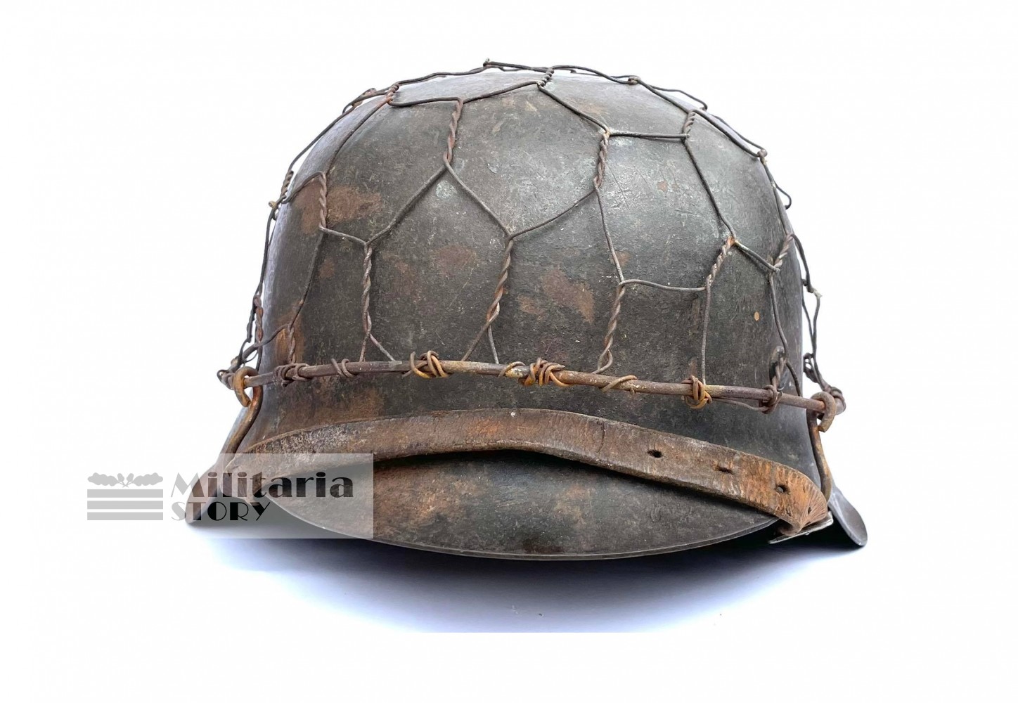 Heer M42 steel helmet with chiken wire camo - Heer M42 steel helmet with chiken wire camo: Vintage German Headgear