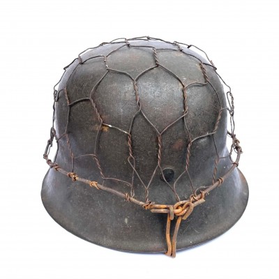 Heer M42 steel helmet with chiken wire camo